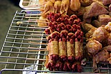 12 fried hotdogs in wonton wrappers.jpg